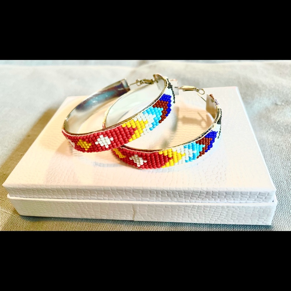 **SOLD**. BEADED HOOP EARRINGS